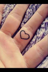 Pin By Kylee Brown On Girl Tattoo Feminine Tattoo Female Tattoo Heart Tattoo On Finger Ring Finger Tattoos Finger Tattoos