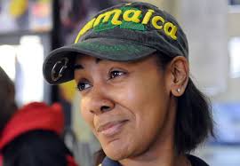 Celebrating a friendly Jamaican restaurateur's life serving spicy,  delightful, food in Albany