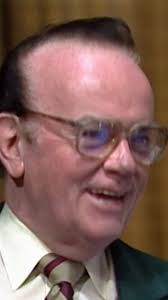 Bob Barker messes around with announcer Johnny Olson