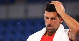 Novak djokovic, of serbia, reacts during the bronze medal match of the tennis competition against pablo carreno busta, of spain, at the 2020 summer olympics, saturday, july 31, 2021, in tokyo. Flghz8fv 3lm