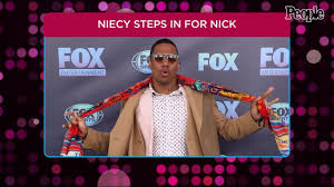 Nick cannon is an american actor, director and host who produces various television, film and music projects. The Masked Singer Nick Cannon Competes As Bulldog Returns As Host People Com