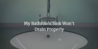 my bathroom sink won't drain properly