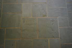 Keep a shop vac nearby to clean up debris. Making Old Discolored Grout Look Like New Young House Love