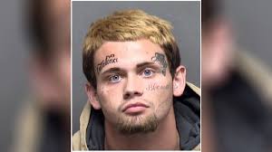 Texas man, 19, allegedly carved his name into girlfriend's forehead, report  says