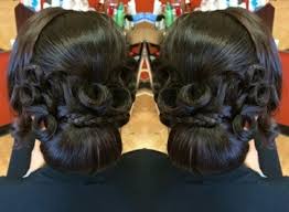 It is a smooth updo for the wedding with a large braid wrapped around the bun. 20 Gorgeous Black Wedding Hairstyles