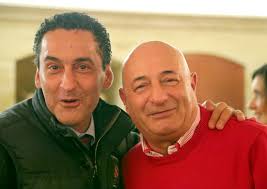 Imprenditori a confronto davanti a un piatto di stoccafisso