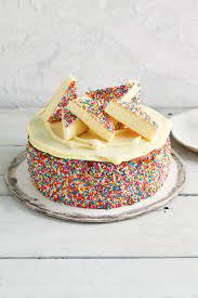 The lovely striped crust for this frozen dessert is made with ice cream sandwiches. Top 100 Birthday Cakes