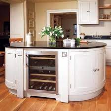 Another important advantage is that the oval shape does not look as massive as a rectangular or square one. Image Result For Small Oval Kitchen Island Curved Kitchen Curved Kitchen Island Round Kitchen Island