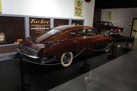 In The Forefront Is Tucker 1026 In Front Of A Tucker Dealership Exhibit At The Aaca Museum Hershey Pa This Is The Automatic Transmission Rat Rod Bmw Car