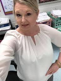 Boyfriend jeans with a Farra top