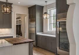 The owners of the home wanted the cardiff marble backsplash to take. White Kitchen Cabinets Grey Backsplash Design Ideas