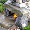 Outdoor fire pit design installation stone fire pits earthworks natural fire pit table hourmings build a beautiful diy stone fire pit creative fire pit designs and diy options. 1