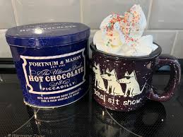 It's a Hot Cocoa and snuggly Coco kind of day!! Be careful all of you that  have to be out today hopefully it's not a “Total Sit Show”  @teddythedogapparel @fortnums #snow #besthotchocolate #