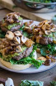 A hearty burger packed with nutty, melty grueyere, deeply browned mushrooms and onions simmered in a red wine reduction, and crisp stir in onions and mushrooms, season with salt, and remove from heat to set aside. Pesto Burgers With Caramelized Onions And Mushrooms The Roasted Root