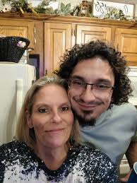 Can someone add my son to a photo for my mom's birthday?