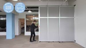 Based on a sliding rod, this hanging room divider. Versare Operable Wall Sliding Room Divider Youtube