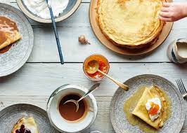 White kitchen cabinets and fixtures partner with sleek stainless steel and glass, blurring the line between contemporary and traditional in this kitchen. 63 Quarantine Recipes To Transport Us To Every Corner Of The Globe Conde Nast Traveler