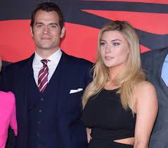 Henry talked to elle magazine as part of the batman v superman promotion. Henry Cavill On Girlfriend Tara King She Protects Me And Is There When I Need Looking After