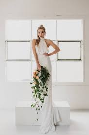 But while mccartney has made wedding dresses, including a corsetted gown with a long train for madonna's scottish castle wedding in 2000, she is not really known for frills or romance. Wedding Dresses Wedding Dress Halter Neck Halter Wedding Dress Meghan Markle Wedding Dress