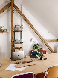 An attic becomes a finished home office for two. How To Make An Attic Office Feel Comfortable Stylish