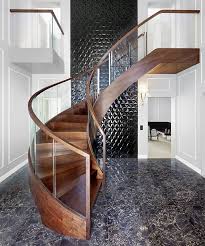 St1100 Br Curved Stair In American Walnut Full Stringers Chamfered Edge Bent Glass Balustrade Stairs Design Modern Stairway Design Glass Staircase Railing