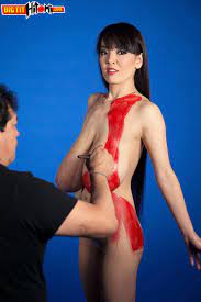 Asian woman Hitomi gets her big saggy breasts covered... - TheyAreHuge.com