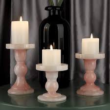 This set of three elegant iron candle holders features twisted stand with uniquely designed legs. Pin On House Wishlist