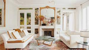 The rattan chair, one of a pair, is. This Colorful Parisian Apartment Is An Invitation To An Imaginary Journey Architectural Digest