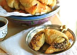 The thyme croissant is one of the classic baked goods served in the morning, made with flour, sugar, yeast, and salt, filled with thyme and garnished with sesame seeds. Zaatar Croissant Taste Of Beirut