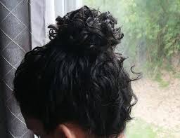Relaxed and textured messy updo. Curly Hair Bun How To Do Curly Messy Bun Updo Hairstyles Curly Bun Mom