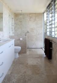 Neutral bathroom design fits very well with narrow space. Travertine Accent Tiles Ideas On Foter Brown Tile Bathroom Neutral Bathroom Tile Tile Bathroom