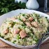 When the time's up, pull out the tray and pour the egg mixture over the salmon and into the gaps. 1