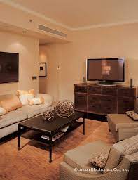 Relax With Friends In This Cozy Living Room To Watch Big Games Movies And Tv Shows Dimmed Lights Create The Per Relaxation Room Cozy Living Rooms Room Lights