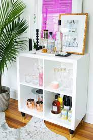 3 ways to style and use ikea s kallax expedit shelf the everygirl ikea bar home decor kallax ikea