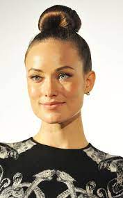 A bun doesn't have to encompass your entire head of hair, you know. Do Or Don T Olivia Wilde S Fanned Out Right On Top Of Her Head Knot Glamour