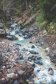 Maybe you would like to learn more about one of these? Stream In The Mountains Large Stones On The Banks Of A Mountain Stock Photo Picture And Royalty Free Image Image 113725464