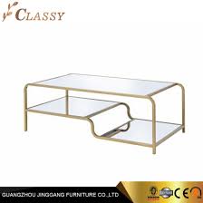 They have an aura of classic beauty. Home Livingroom Tempered Glass Coffee Table In Curved Golden Metal Frame China Glass Table Coffee Tables Made In China Com