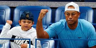 Tiger's son, charlie axel, is now 11 and his daughter, sam alexis, is 12. Video Tiger Woods Caddies For Son Charlie At Junior Golf Event Business Insider