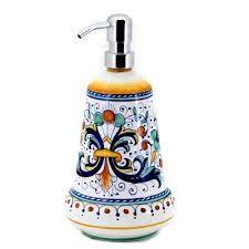 Soap dispenser wall mount and hand pump are made out of brass with a polished chrome or satin nickel finish. Artistica Italian Ceramics Italian Pottery Deruta Pottery Soap Dispenser Deruta Pottery
