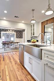 Avenue B Kitchens Benjamin Moore Classic Gray Flatiron Dining Table Union Sq Trendy Farmhouse Kitchen Farmhouse Style Kitchen Kitchen Sink Inspiration