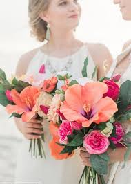 This exotic hibiscus flower in a fabulous mix of corals and oranges is sure to be the focal point of your diy tropical wedding bouquet! Pin On My Wedding