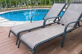 Are pool chair really worth investing in? Relaxing Chairs At Beautiful Swimming Pool Stock Photo Picture And Royalty Free Image Image 126397254