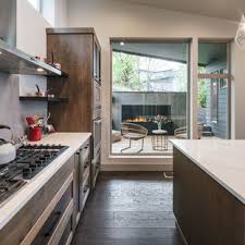 What kind of tint do they have? 75 Beautiful Kitchen With Brown Cabinets Pictures Ideas July 2021 Houzz