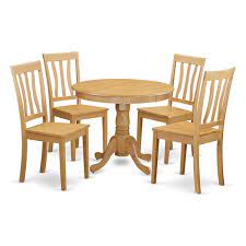 The set comes with two chairs and space for two additional chairs if you should need them. East West Furniture Antique Dining Set Wood Oak 5 Pieces Lowe S Canada