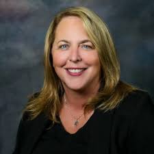 The smile of a proud mother, especially when she says “Mom, I'm following  your example.” Chemistry with minors in forensics and business. It finally  came in the mail so another celebration was