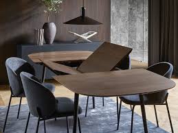 Oak extending dining table and grey chairs with chrome. Modern Designer Dining Tables Boconcept