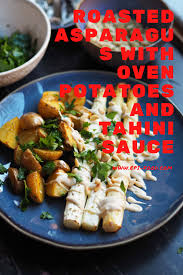 Roasted Asparagus With Oven Potatoes And Tahini Sauce In 2020 Roasted Asparagus Potatoes In Oven Tahini