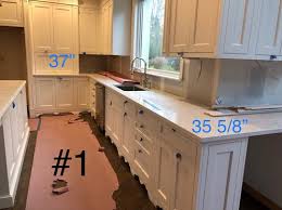 In order to ensure they are, take measurements up the wall from the highest point on the floor. Different Height Base Cabinets Wall Cabs Not Straight Crazy Crown
