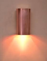 This exterior light fixture features a venetian bronze finish for a touch of class and elegance outside your home. Brass Copper Or Stainless Steel Half Round Cylinder Wall Etsy Copper Wall Sconce Exterior Wall Light Interior Wall Sconces