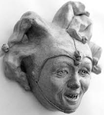 Foolish Jester, a Funny Cast Stone Joker Garden Art Wall Sculpture